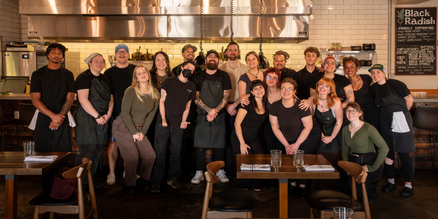 Matthew Swezey and members of the Black Radish team inside the Tallahassee restaurant.